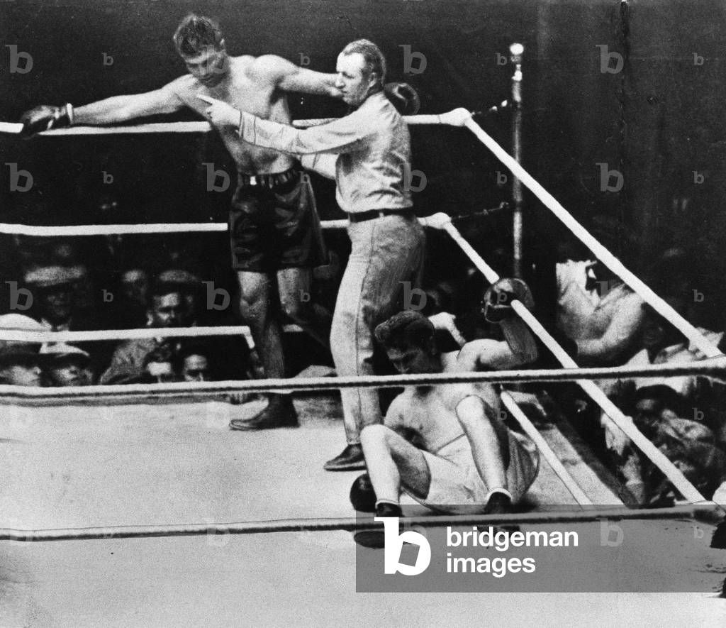 Jack Dempsey (on ropes) v George Tunney, World Heavyweight Championship, held at Soldier Field, Chicago. 22nd September 1927 (b/w photo)