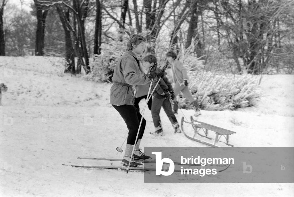 Weather snow scenes at Hampstead Heath. Winter: A skin enthusiast tries out the slopes. November 1969