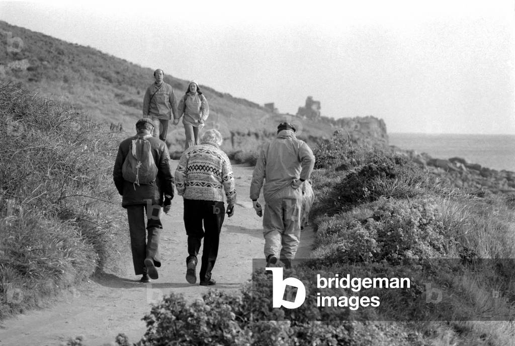 Prime Minister Harold Wilson seen here on the Scilly Isles, taking a walk along the coastal path March 1975 (b/w photo)