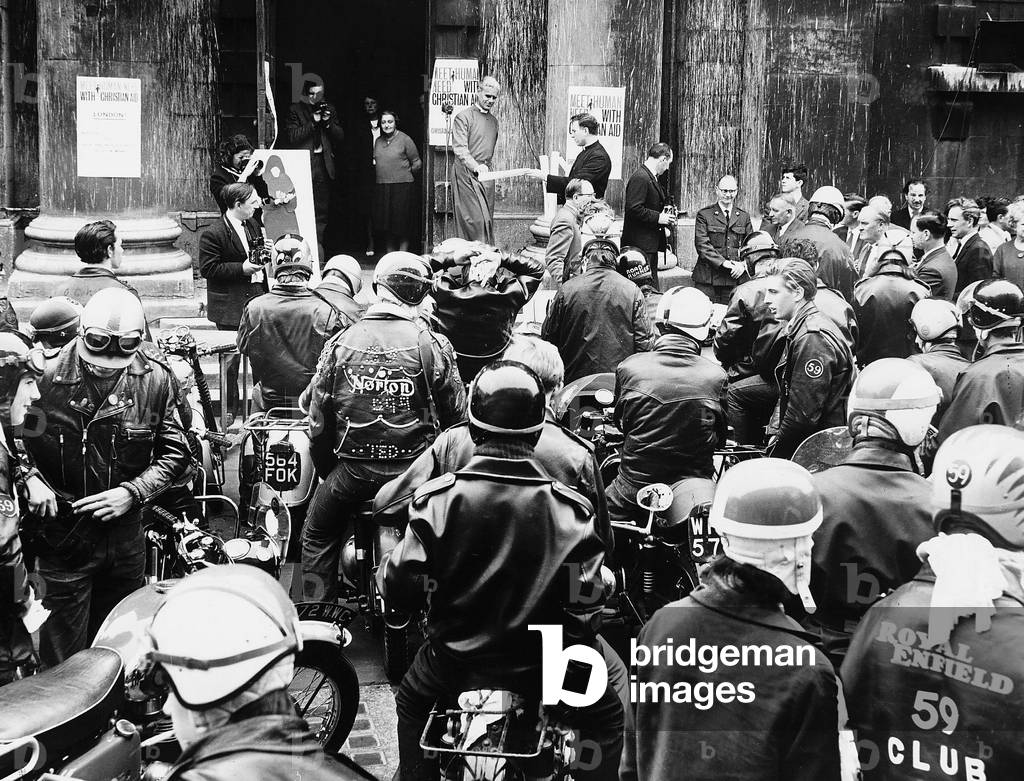 Nearly a hundred Rockers and girlfriends at the church of St Martin in the Fields Trafalgar Square to help launch a campaign in aid of starving people overseas at the start of Christian aid Week, 23/05/1964 (b/w photo)