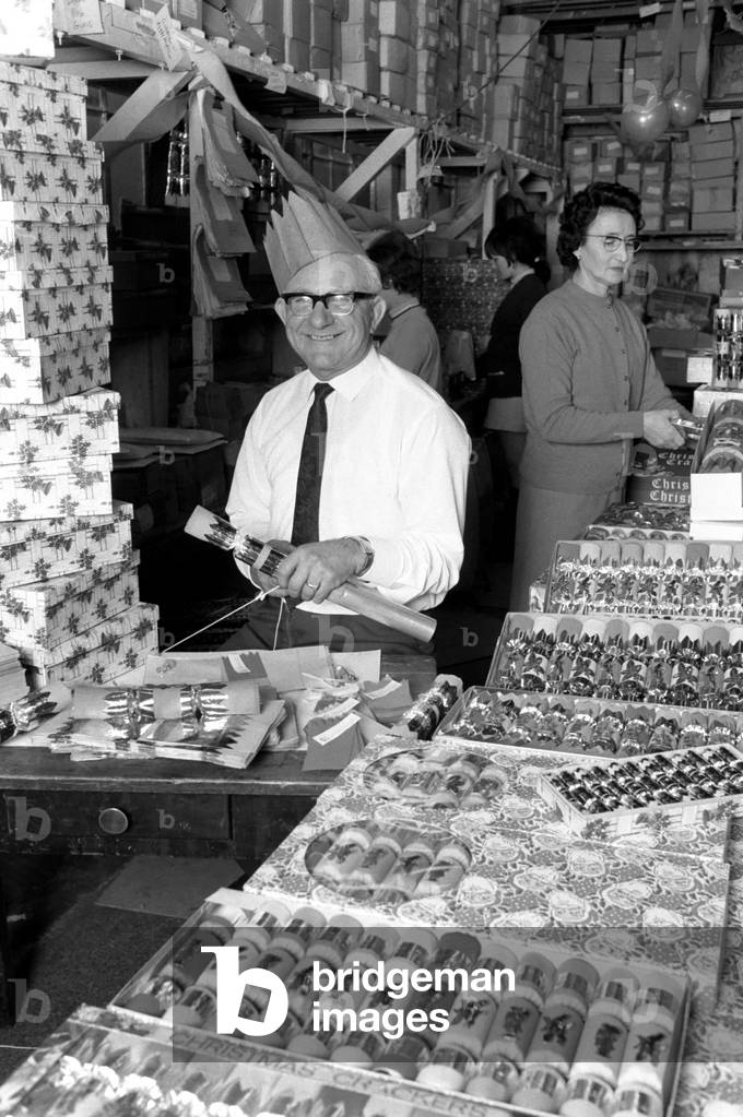 While most people today are trying to forget Christmas, workers at Napier Novelty Company Ltd in Rickmansworth, returned today and started to produce crackers for Christmas 1970, December 1969