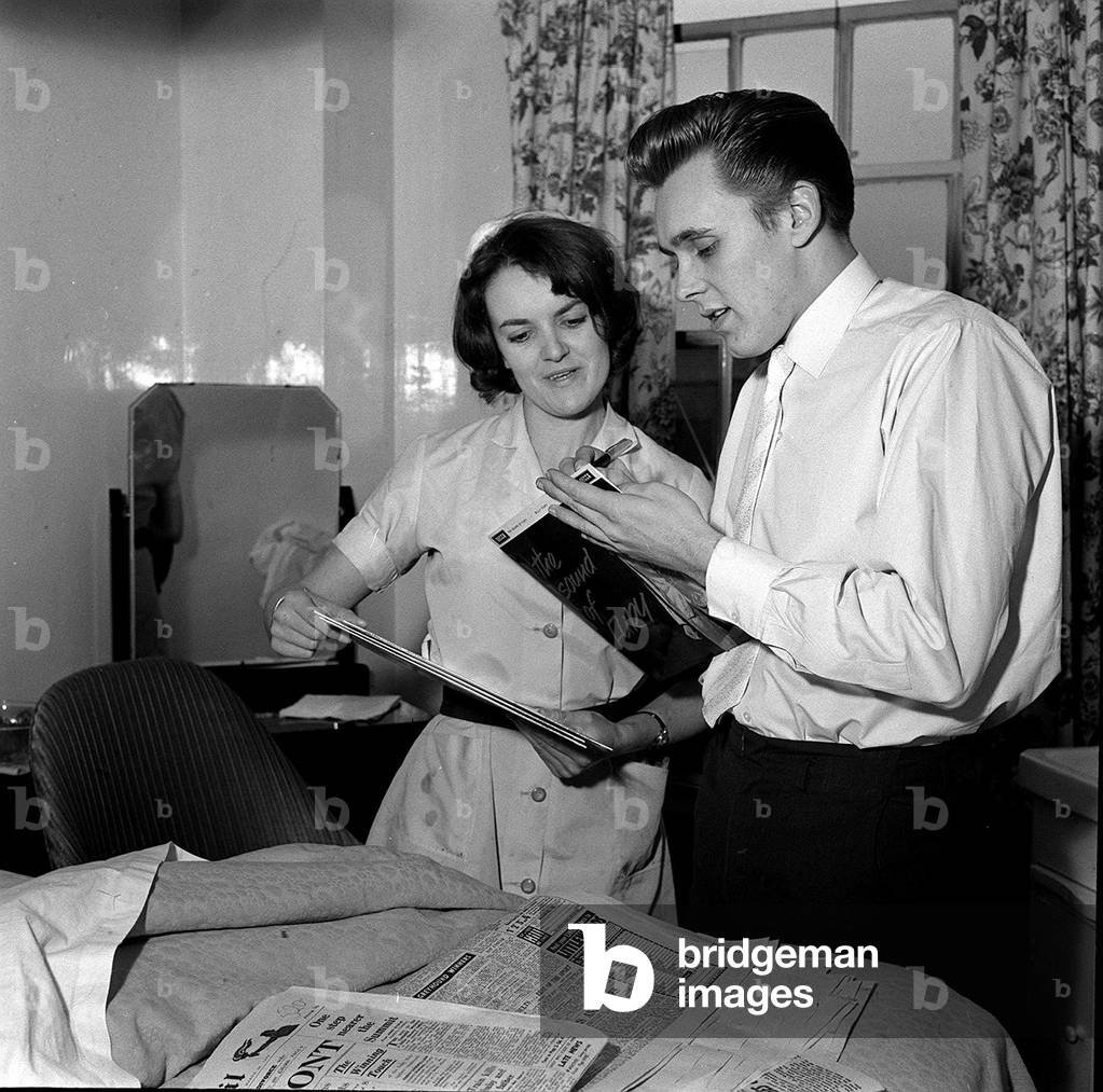 Billy Fury pop singer who collapsed after a show photographed at the London Clinic today when about to leave to commence work again next Sunday at Exeter, 1960 (b/w photo)