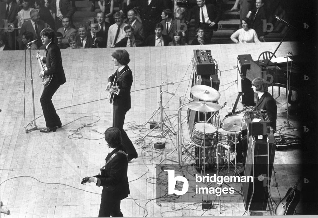 The Beatles in concert during European Tour June - July 1965.

Date Taken Unknown
