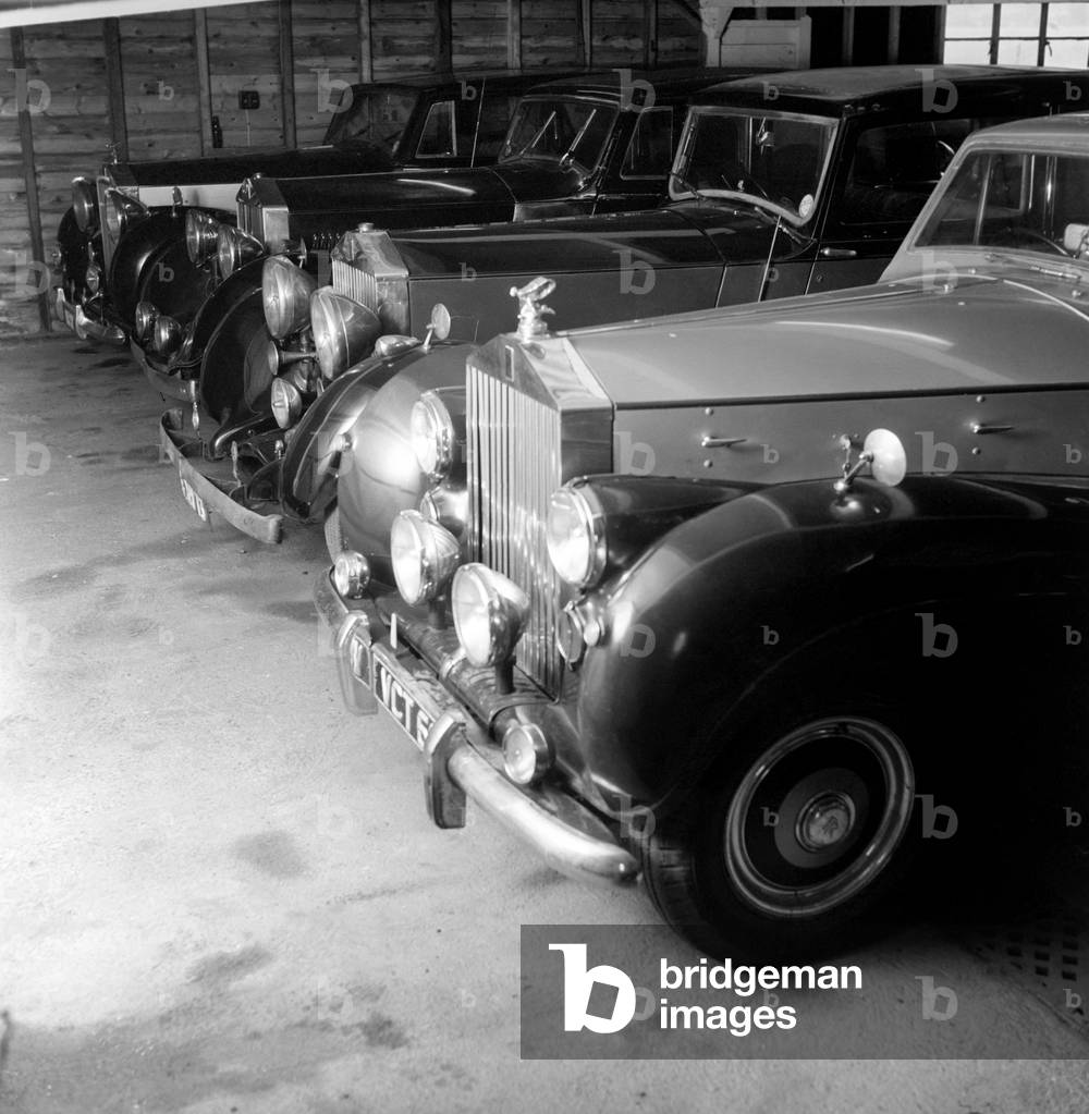 A collection of Veteran Rolls Royce cars stored in a Nissen hut, 1963 (b/w photo)