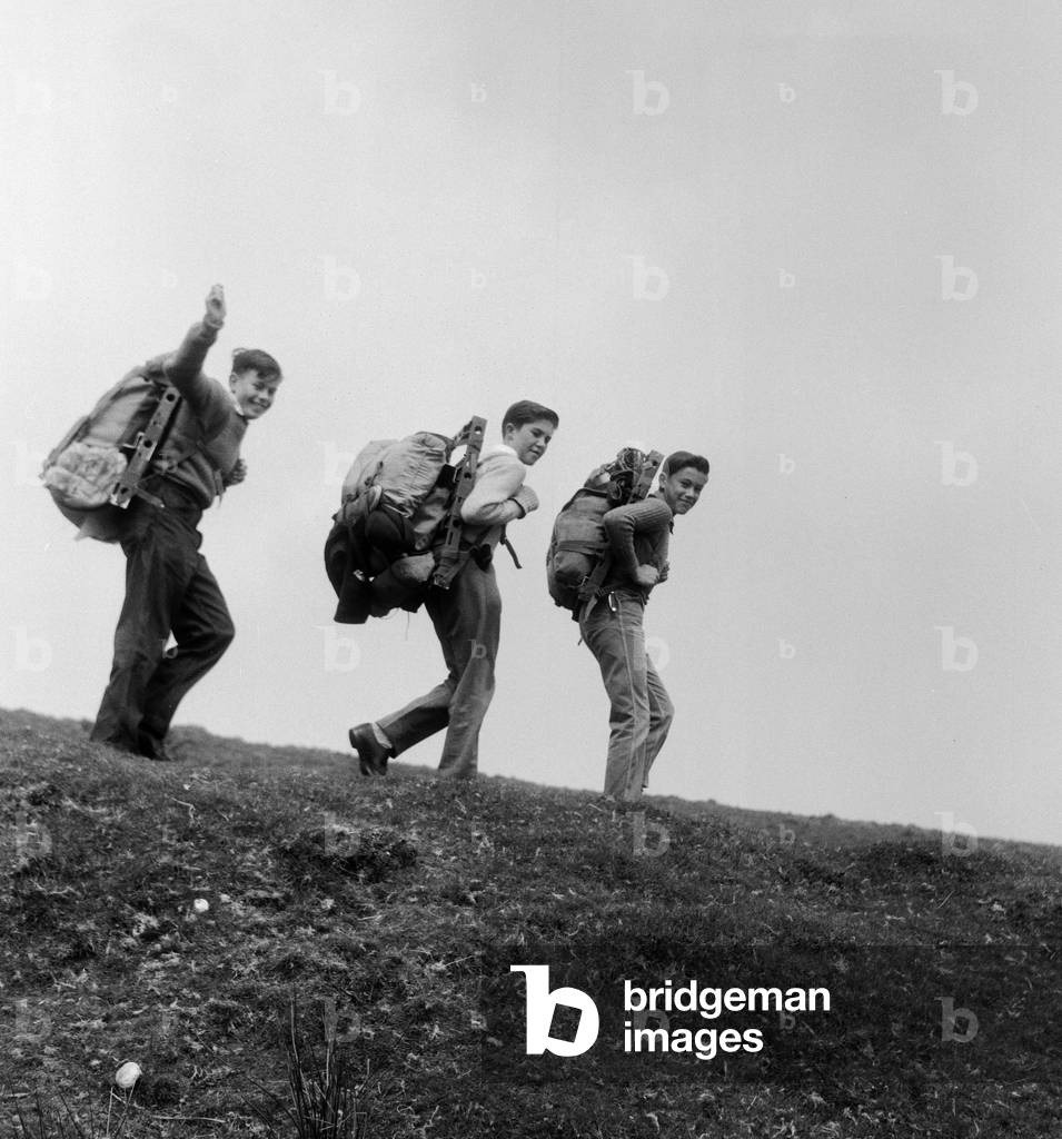 Brian Tucker (leading), Peter Hopkinson and Ian Edwards of Plympton, Devon in the 30 mile Fend For Yourself hike in the Duke of Edinburgh's Award Scheme Expedition.  1961 (b/w photo)