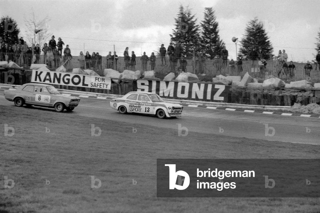 Britain's ex-ski champion Divina Galicia crashed her £6000 car on the second lap of her very first professional race at Brands Hatch today, 2nd February 1975 (b/w photo)