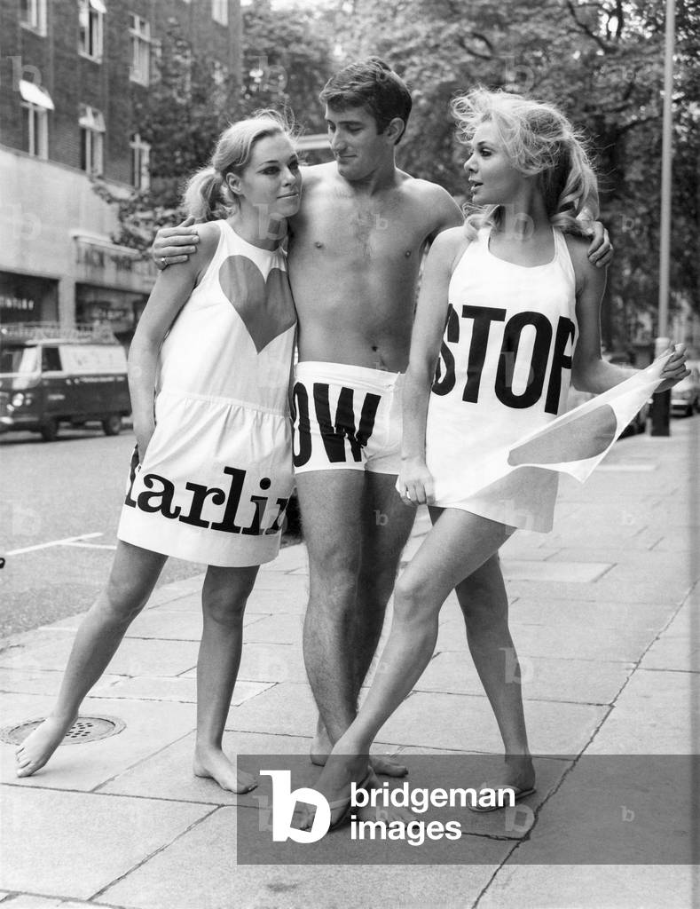 Fashion - 1960s. New swimwear. Svend, the famous Scandinavian designer is now the design director for Jantzen and in London on Wednesday (19-10-66) he showed his first collection of on-and-off-the-beach wear for 1967. Joan Crane (left) wearing 