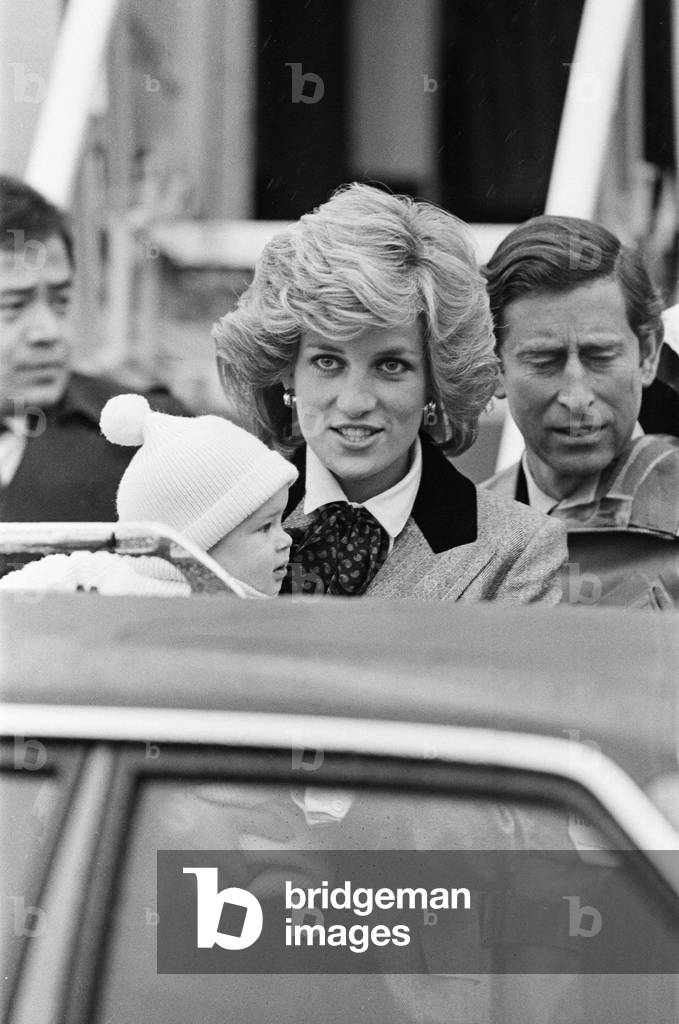 HRH Princess Diana, The Princess of Wales pictured with her 2nd son, Prince Harry, (born 15th September 1984), 22nd March 1985 (b/w photo)