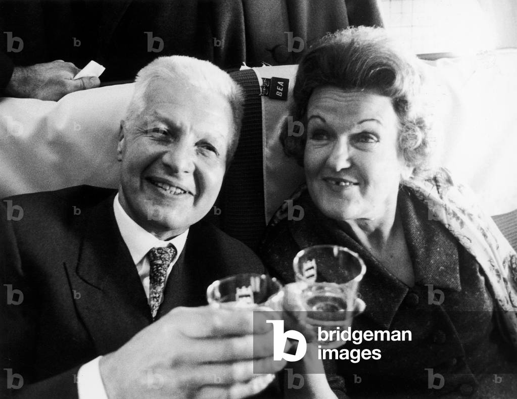 Russian spies Peter and Helen Kroger on a champagne flight after leaving Heathrow for Poland after their release from prison.
27th October 1969.