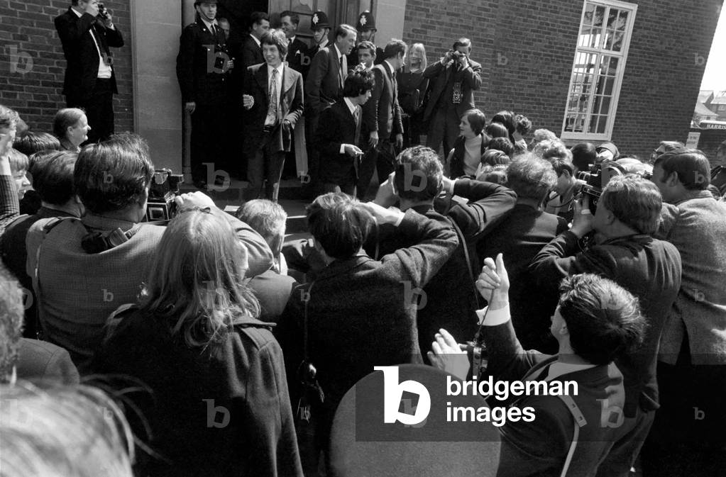 Crowds throng around Mick Jagger and Keith Richards on 10 May 1967 outside Chichester Crown Court when they leave court during the lunch break of the hearing for drug offences.