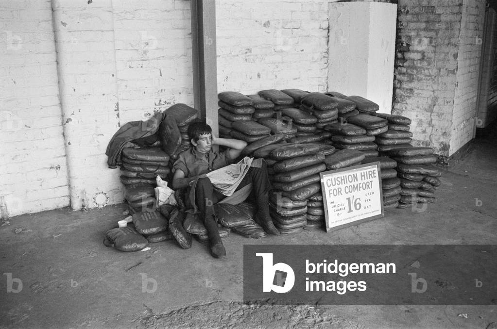 Test Match at Old Trafford. 
Cushion seller asleep.
13th June 1969.