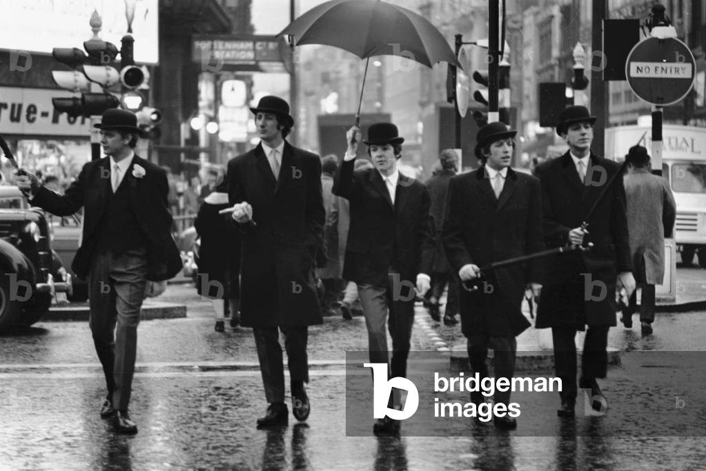 Pop group 'The Fortunes' seen here posing as city gents. 22nd December 1965 (b/w photo)