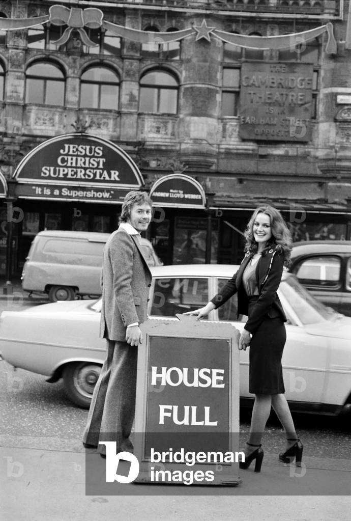Jesus Christ, Superstar's Christopher Neil (Jesus of Nazareth) and Anna Macleod (Maria Magdalene) with house full sign outside the Palace theatre, January 1975