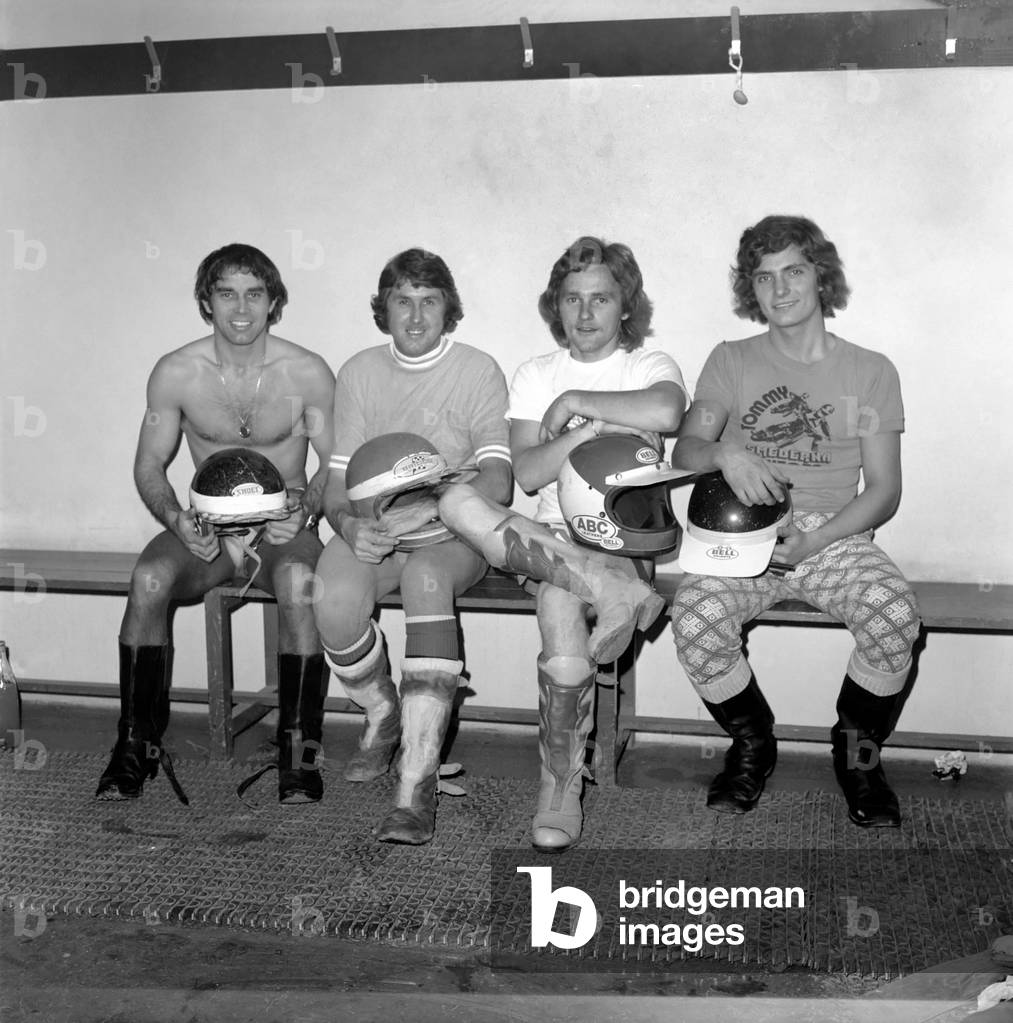 Speedway Riders l-r: Ivan Mauger, Barry Briggs, Scott Autrey (Exeter) and Tommy Jansson (Wimbledon) pictured in the dressing room at Wimbledon Stadium, 17th April 1975 (b/w photo)
