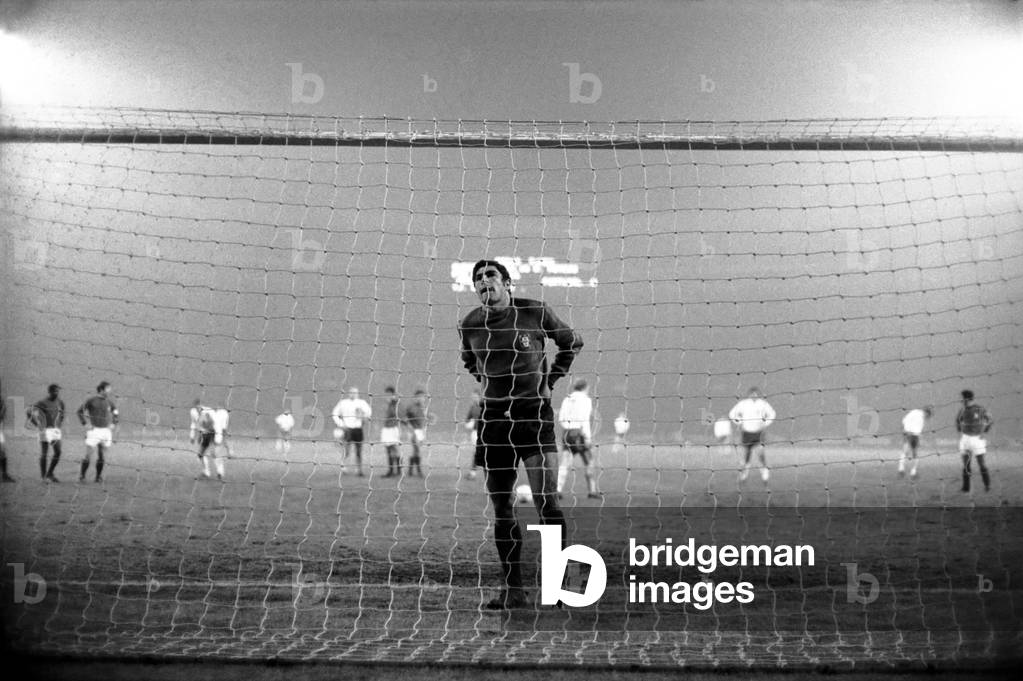 England's v. Portugal. Penalty! French referee Mouton wards off angry Portugese protests. January 1970 (photo)
