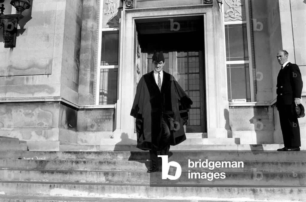 Southampton skipper Terry Paine apart from various business interests is now a councilor with Southampton Borough Council. Terry has recently opened yet another business venture, a Greengrocers. Terry leaves Southampton Town Hall passing a saluting sergeant at arms Mr. Charles Watson. November 1969 (photo)