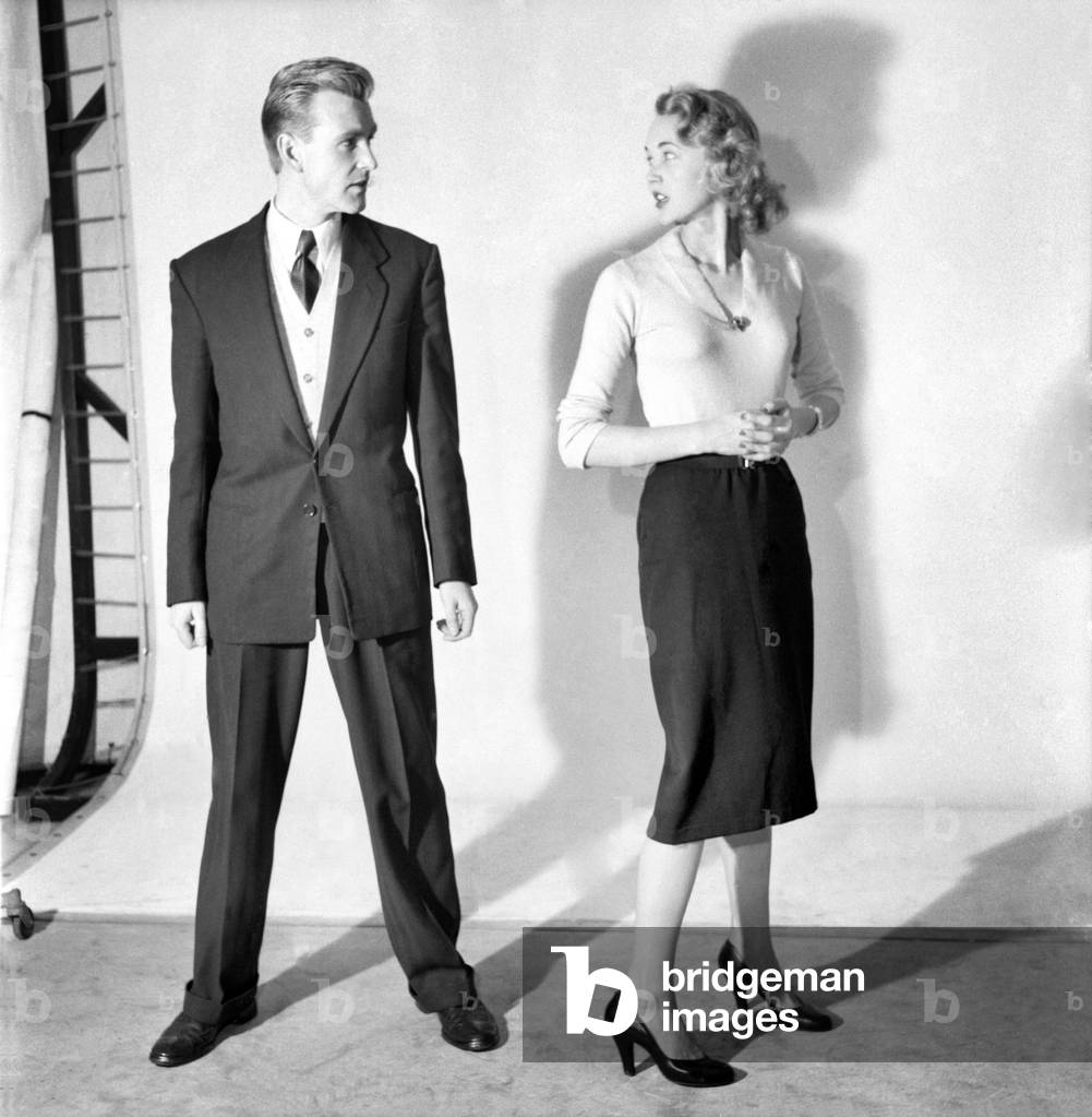 Romance: Couple in the studio used for kiss and make up feature. November 1953