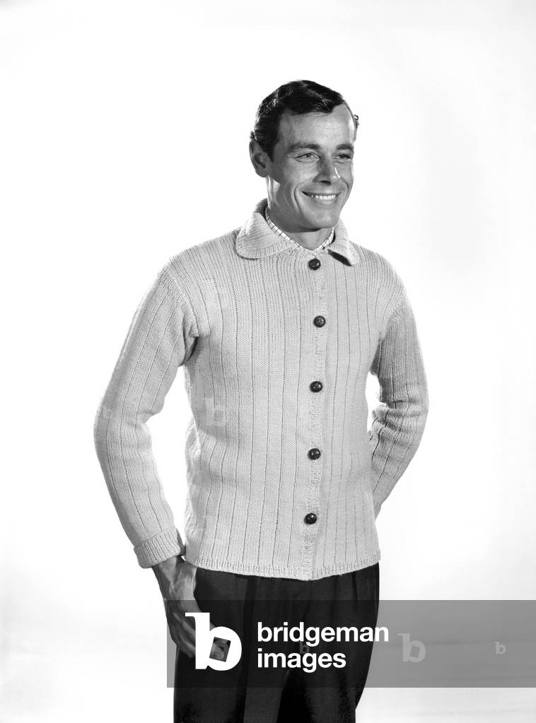 Model John Handy wearing cardigan in Reveille Studio . 1960