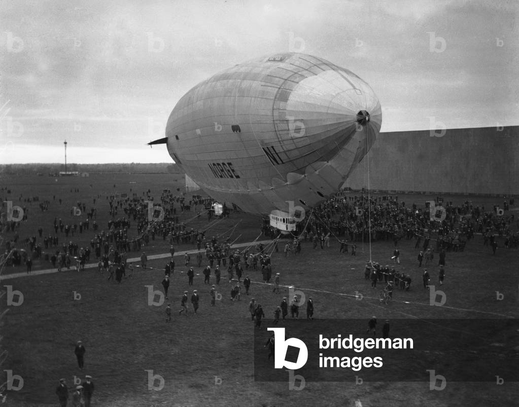 The Italian-built airship Norge, piloted by Colonel Umberto Nobile, and George Herbert Scott seen here landing at Pulham en route to making the first crossing of the North Pole, 11th April 1924 (b/w photo)