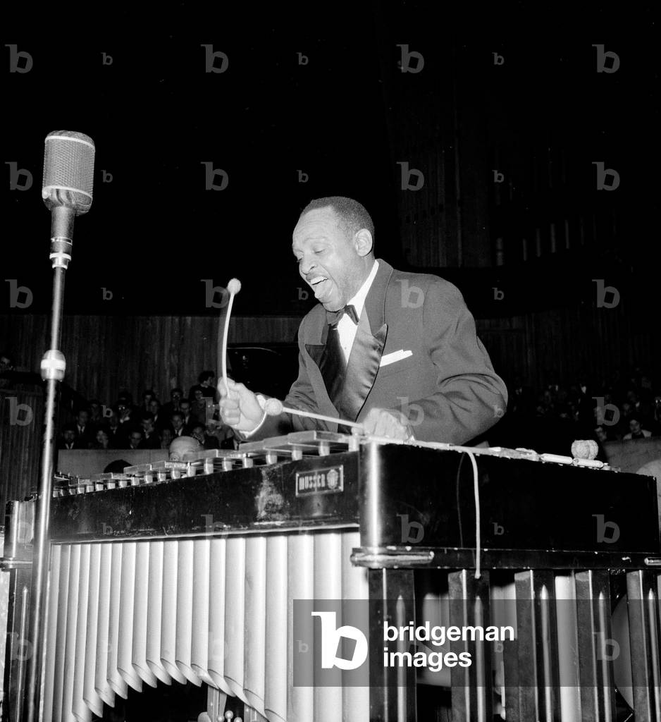 Lionel Hampton, band leader at the Royal Festival hall in London playing on xylophone, 15th November 1956 (b/w photo)