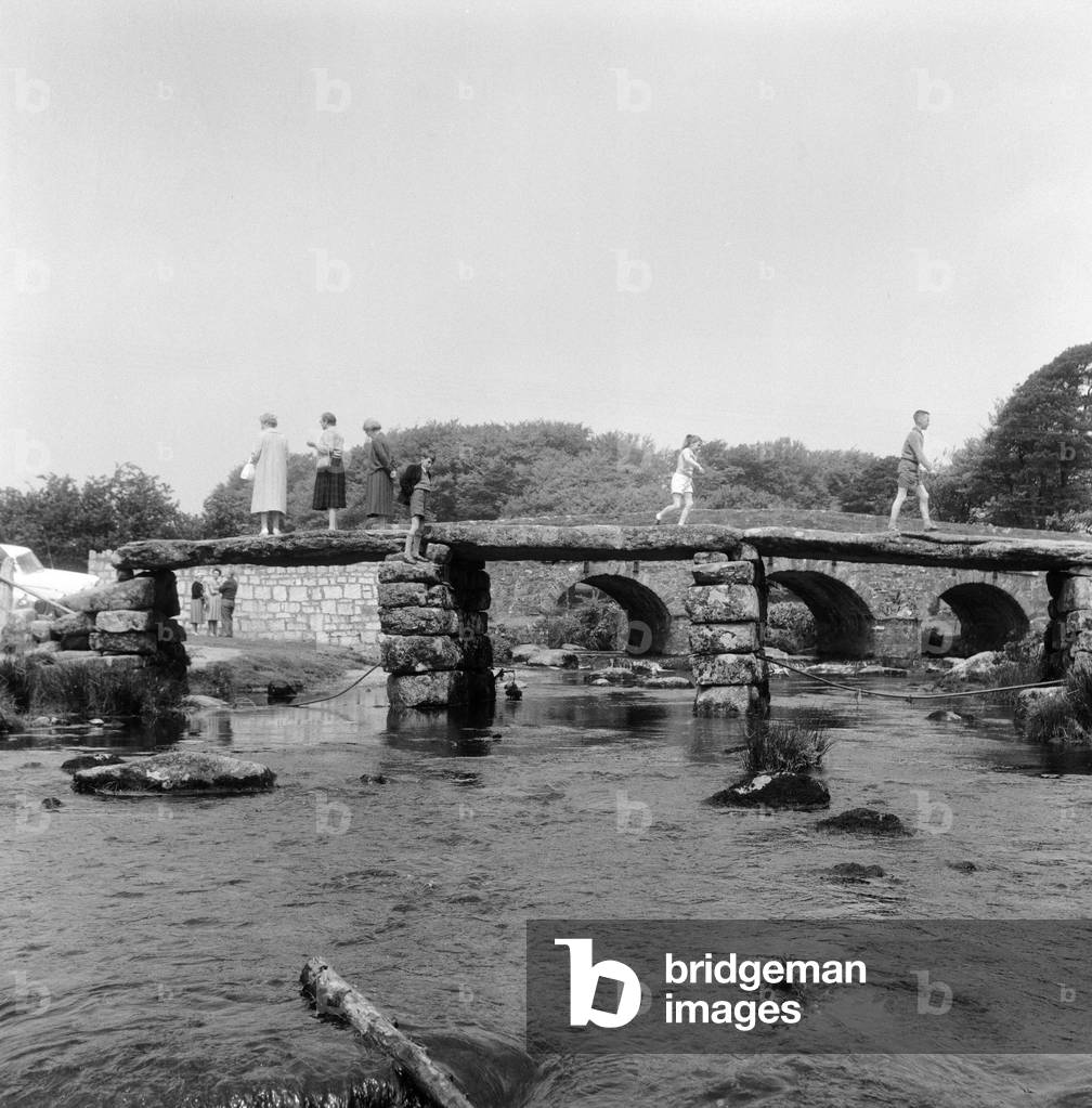 A quiet holiday at a beauty spot away from the more crowded roads was enjoyed by holidaymakers at Postbridge, Dartmoor.  21st May 1961 (b/w photo)