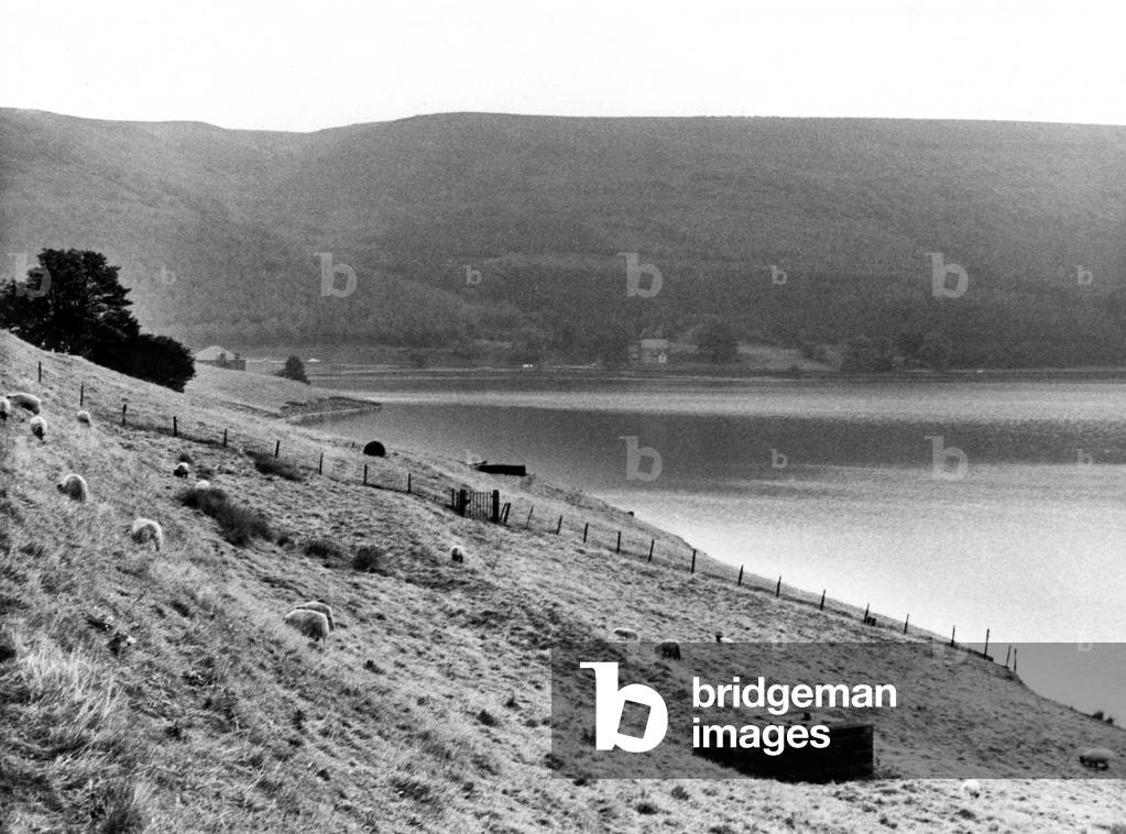 Ladybower Reservoir on the snake road to Sheffield. Ladybower Reservoir is a large Y-shaped reservoir, in the Upper Derwent Valley in Derbyshire. 1965 (b/w photo)