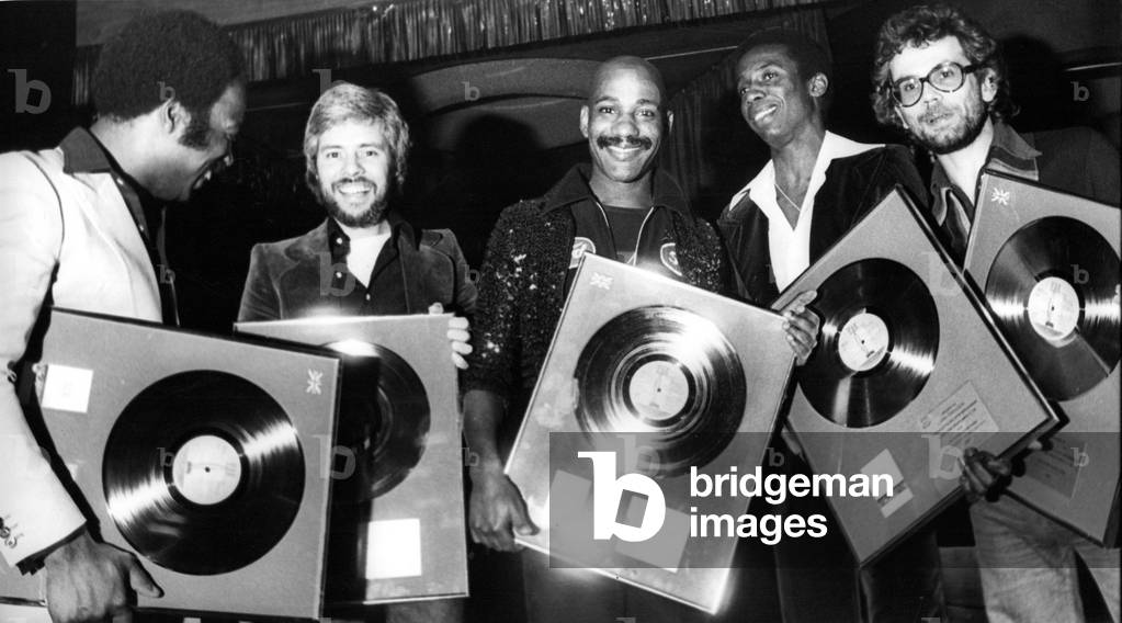 Disco Kings Hot Chocolate came to Newcastle to be presented with individual silver discs marking UK sales of 100,000 for their greatest hits album, 2 December 1976 (Patrick Oliver, Harvey Hinsley, Errol Brown, Larry Ferguson and Tony Connor)
