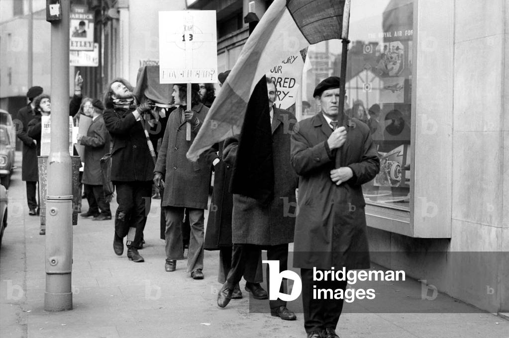 I.R.A. Demonstrators carried an Irish tricolour and a coffin outside the Army Careers Centre in Fountain St, Manchester, 31st January 1972 (b/w photo)