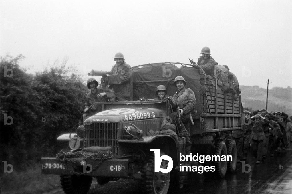 German Soldiers captured in Cherbourg are escorted to camp by allied forces, 30th June 1944 (b/w photo)
