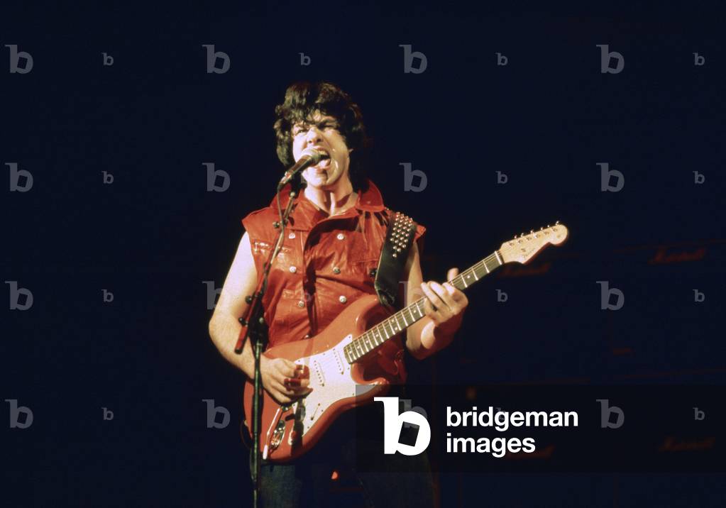 British blues guitarist and singer Gary Moore performing in concert at the Hammersmith Odeon, London.
February 1984.