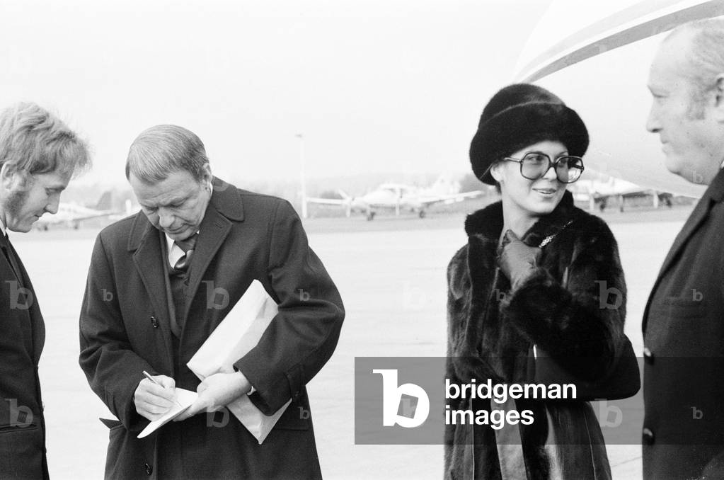 Frank Sinatra, flies into London Gatwick Airport, on his personal Gulf stream jet, Sunday 15th November 1970 (b/w photo)