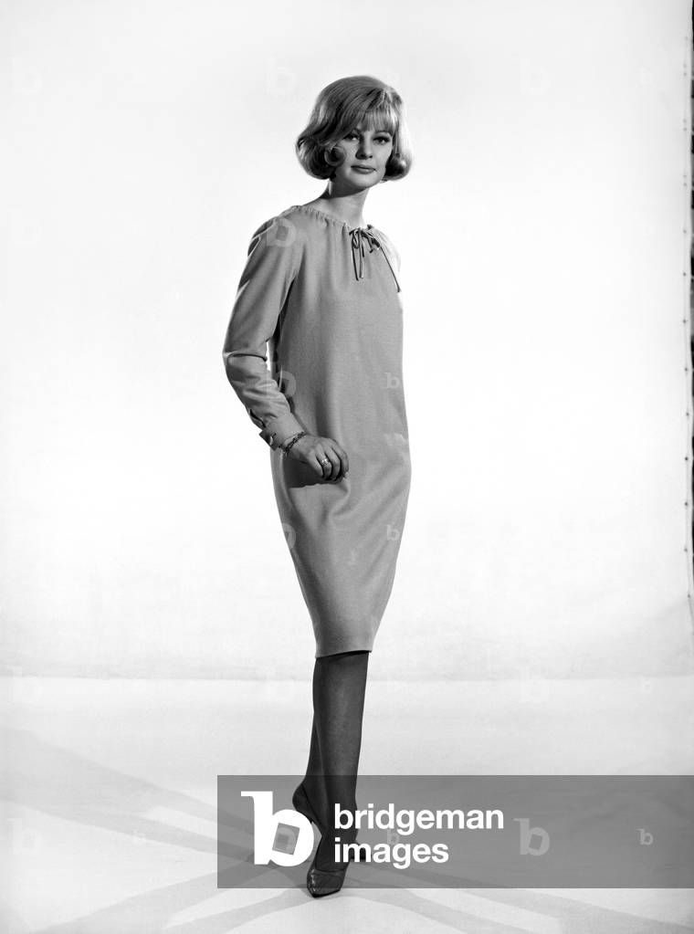 Clothing: Fashion: Dress: Dawn Chapman seen here modelling bat meal dress. 1965 (b/w photo)