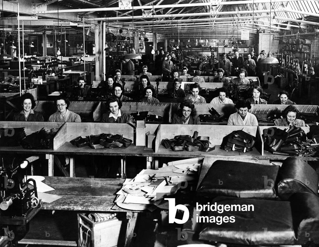 Women at work in a factory sewing leather products. Speke, Liverpool, 8th January 1946 (b/w photo)