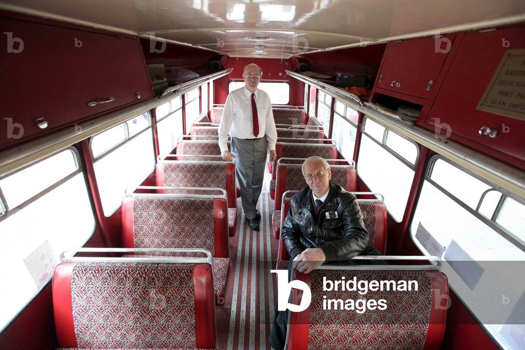 Standing out from the regular buses seen in a city centre, this collection took passers-by back in time. And the vintage buses certainly attracted crowds while parked in Newcastle city centre this week as members of the Aycliffe and District Bus Preservation Society brought their vehicles out for show. From converted double deckers to models dating back to the 1940s, this group preserves part of the transport history of North East. Pictured Peter Mitchell, left and Dave Young, with the 1949 Bristol single decker, from Aycliffe and District Bus Preservation Society, in the centre of Newcastle, 31/10/2013 (photo)