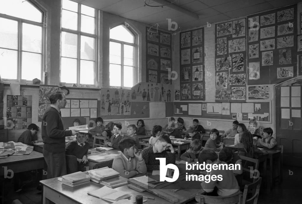 One of the smallest primary schools in Coventry, All Saints, in Vecquery Street, is to be replaced at a cost of £72,000. All Saints was founded in 1877 and is in need of replacement on account of its age and unsatisfactory condition, but it must be replaced in any case because of road plans. Negotiations are taking place for a site near the Charterhouse, London Road, Coventry. 4th April 1968 (b/w photo)