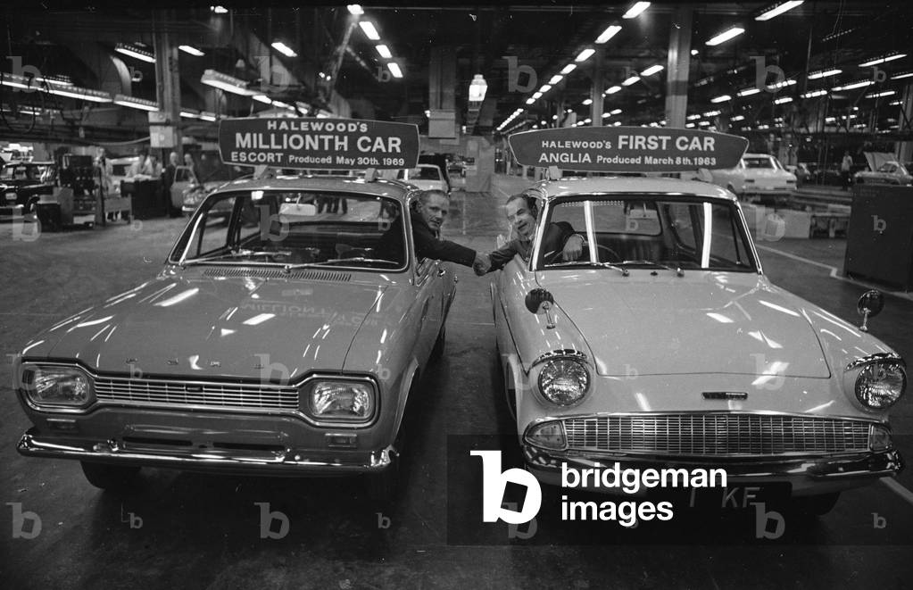 The millionth car produced at the Halewood plant of the Ford Motor Company marked two milestones. An important change in management, as the Operations Manager Stan Cross leaves for promotion & Charles Skinner takes over, and the 1,000,000th car produced was presented to charity 30th May 1969 (b/w photo)