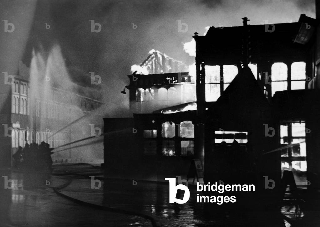 Firemen tackling a fire at The York Restaurant and the Coronation Ballroom at Belle Vue. 2nd February 1958 (b/w photo)