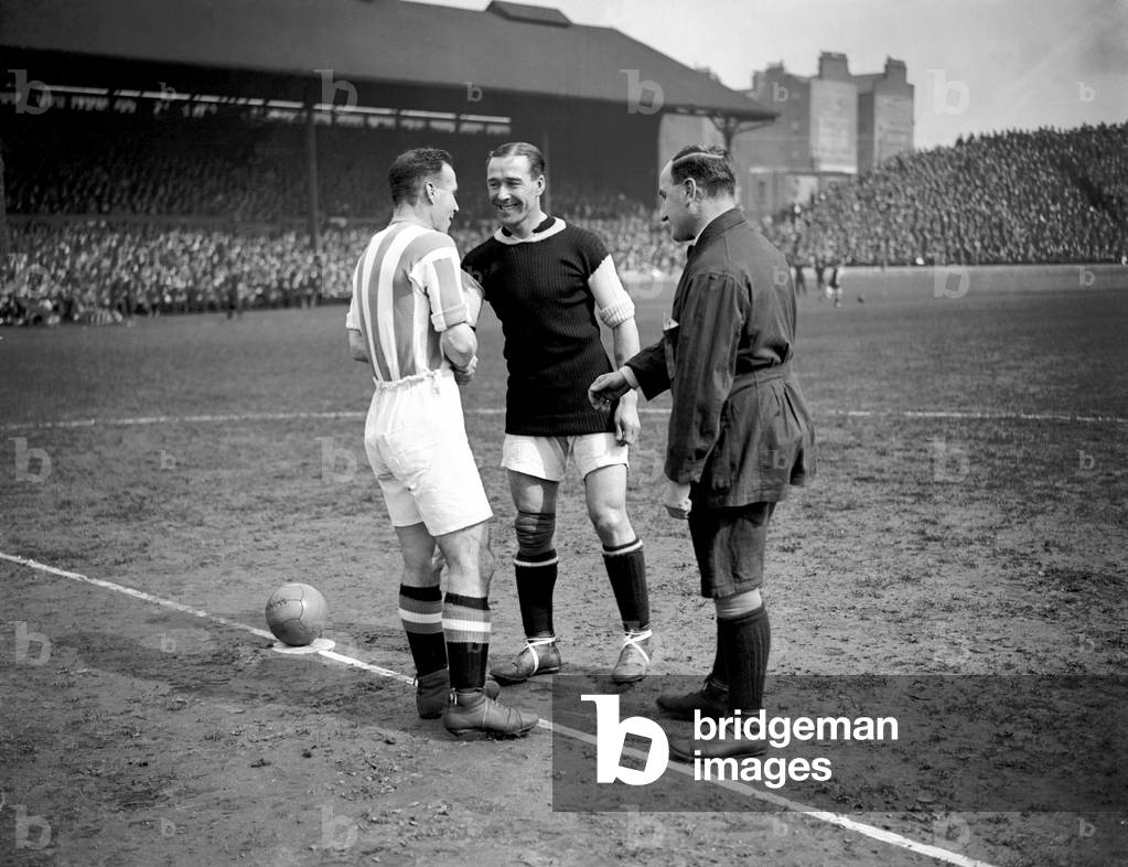 Cup Final at Chelsea. Aston Villa 1 v. Huddersfield 0. Captains shake hands A. Ducat of Villa and Bullock of Huddersfield, 24th April 1920