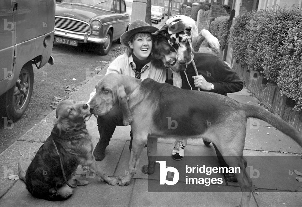30 year old pop star P.J Proby announced his engagement to British actress Vanessa Forsythe. He has two problems however, he is £84,000 in debt and is unsure of the legal standing with his two previous wives. OPS P.J Proby and Vanessa Forsythe outside his Hendon home with their dogs, November 1968