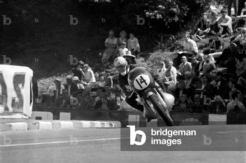 Sport Motorcycling: Isle of Man TT Racing 350 CC Class Junior. Brian Steenson on his way to second place. June 1969