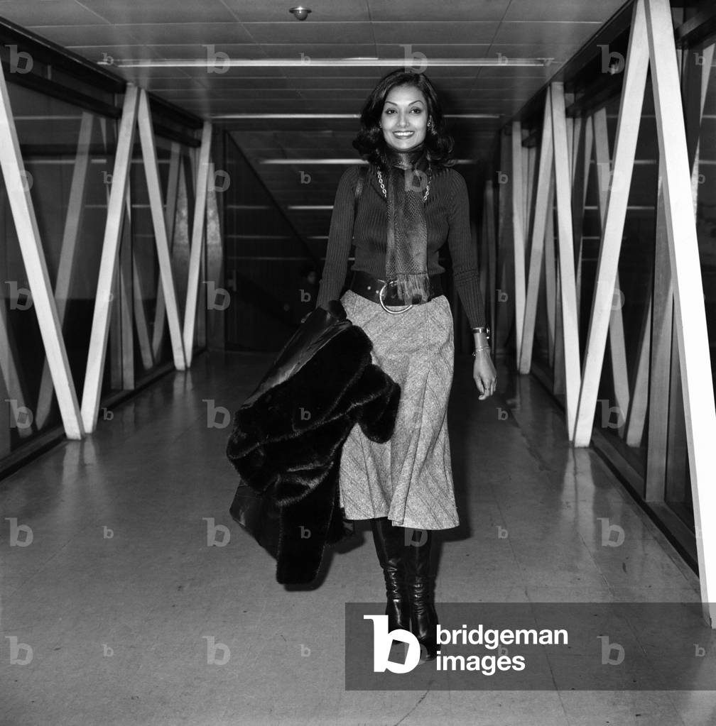 Shakira, wife of actor Michael Caine leaves Heathrow Airport today to join husband in Marrakesh where he is making a film called 