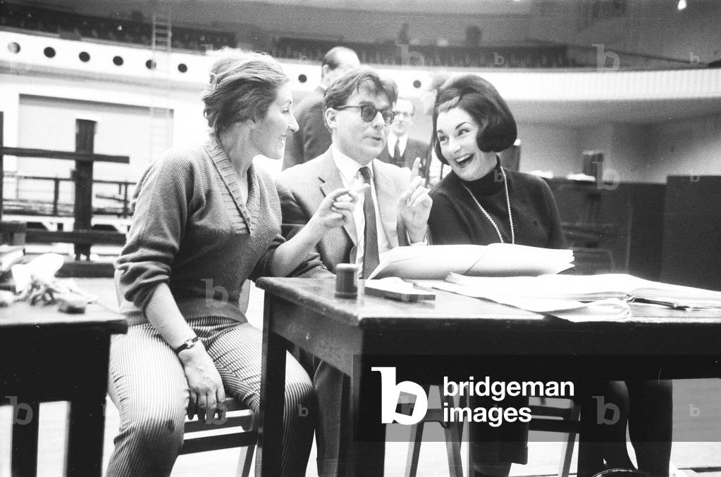The London Opera Centre, Commercial Road, East London has been now begun its career and is functioning as a training ground for young opera singers, and is a rehearsal stage for the Covent Garden Opera Company. The stage is an exact copy of the stage at the Royal Opera House Covent Garden. Our Picture Shows: Left to Right Barbara Howitt, the conductor Edward Downes and Marie Colyer who plays the lead in the Covent garden production of Katerina Ismailova, 14th November 1968 (b/w photo)