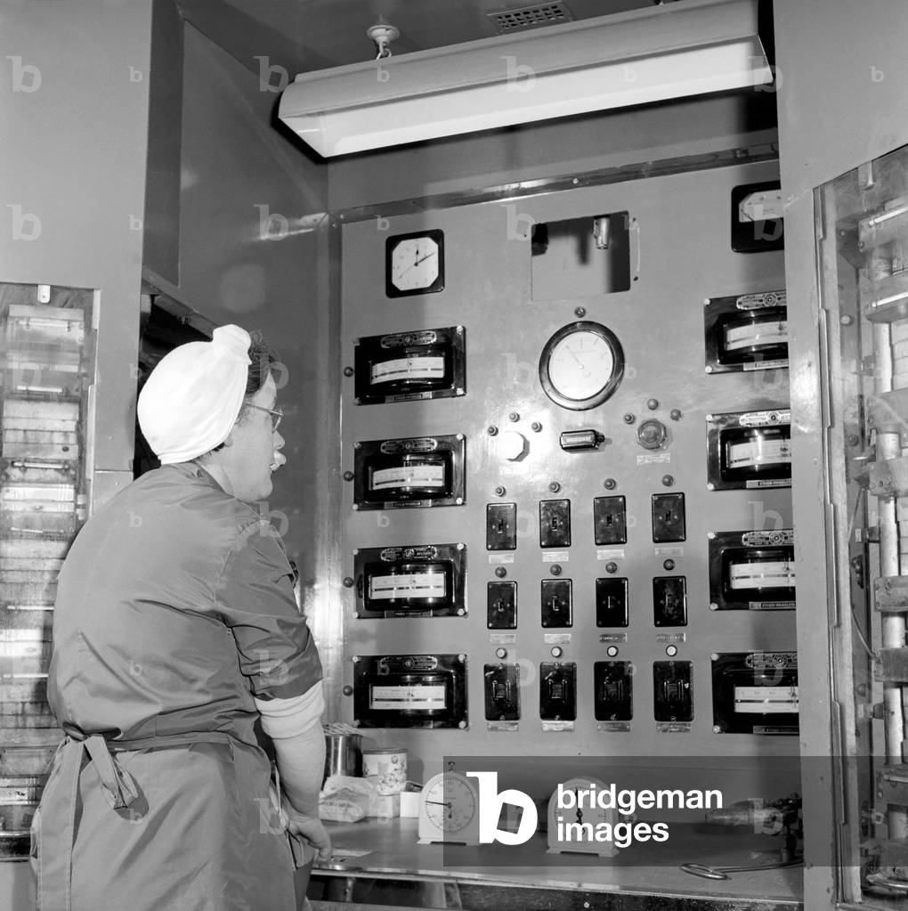 False teeth factory in Dundee: The factory makes and bakes in their kiln (oven) false teeth for all U.K. N.H.S. dentists, 1963 (b/w photo)