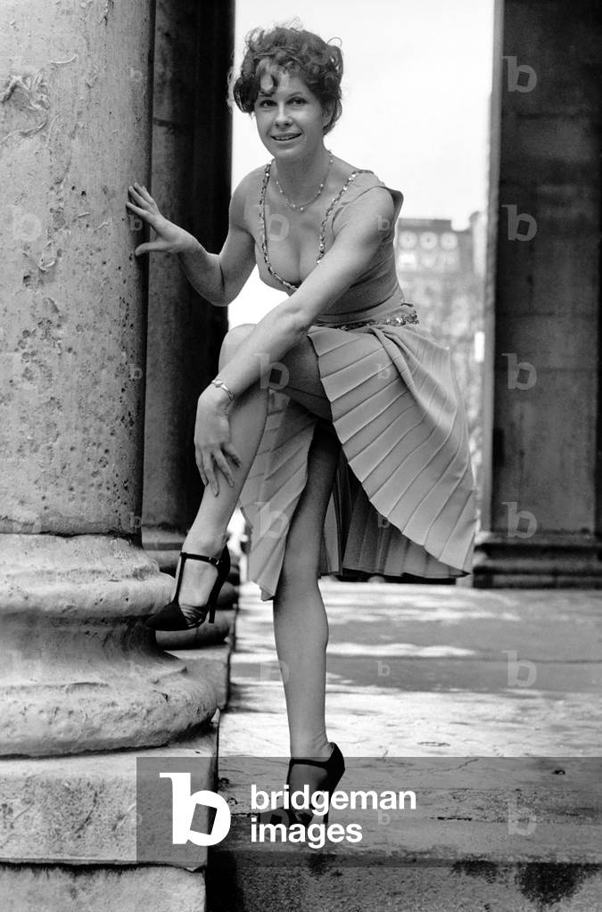 Chris Cooper wears a new style stiletto heel, March 1975 (b/w photo)