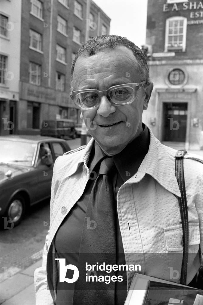 World famous harmonica player Larry Adler appeared at Bow Street Magistrates Court on charges of taking two packets of toffees without paying from a Piccadilly store. The case was dismissed, July 1975 (b/w photo)