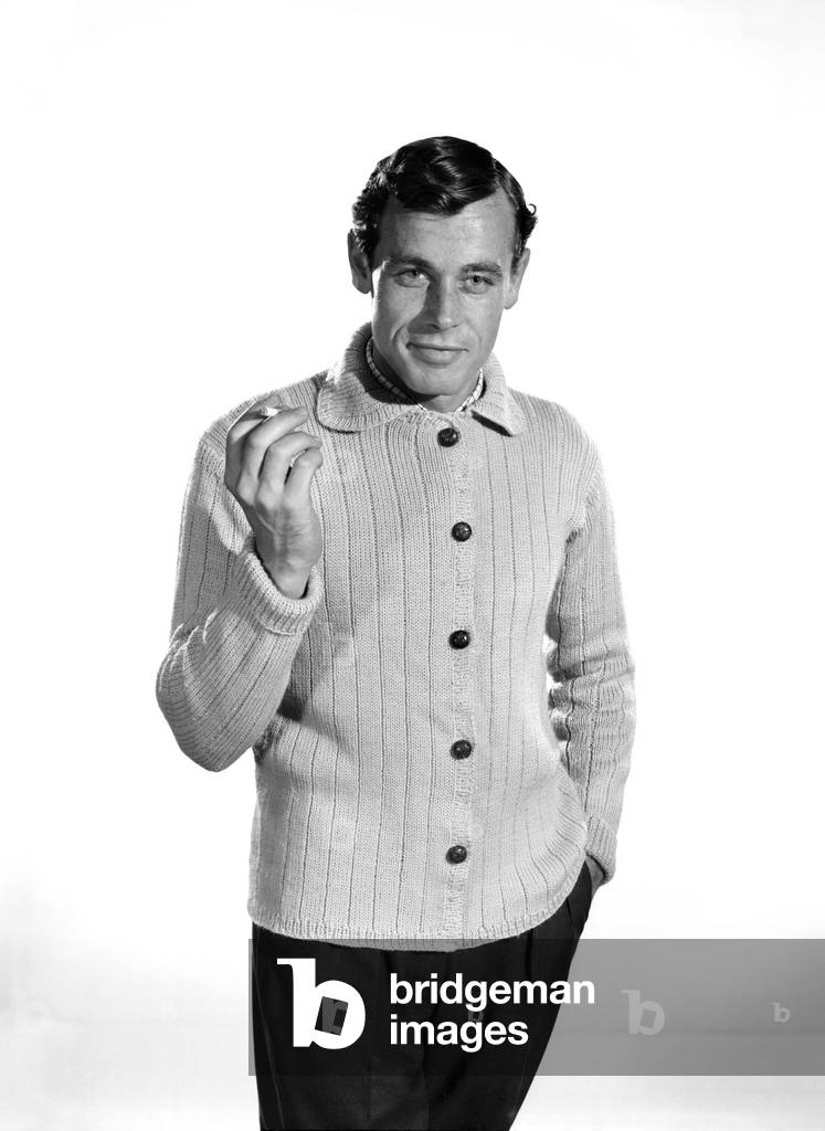 Model John Handy wearing cardigan in Reveille Studio . 1960