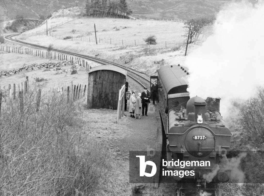 The last passenger train leaving Bala Station on the Bala-Blaenau Ffestiniog line. January 1960 (b/w photo)