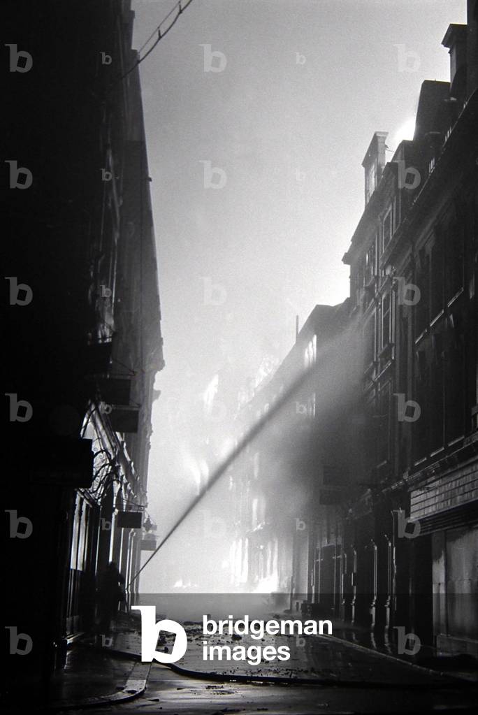 Fires from High Explosive during the 2nd Fire of London Ave Maria Lane, December 1940 (b/w photo)