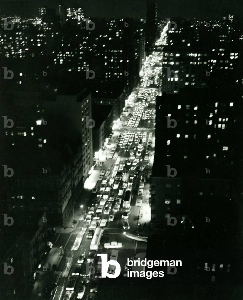 USA New york looking from Bookman tower skysccraper the Traffic streches for miles into the night as thousands of cars our into the city 
views of New york at night. October 1964