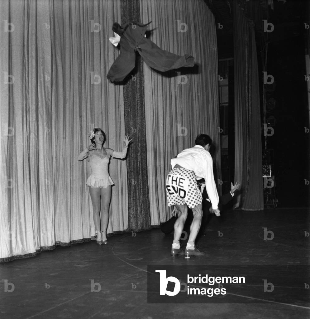 Warren, Latona, and Sparks act at the Palladium.
